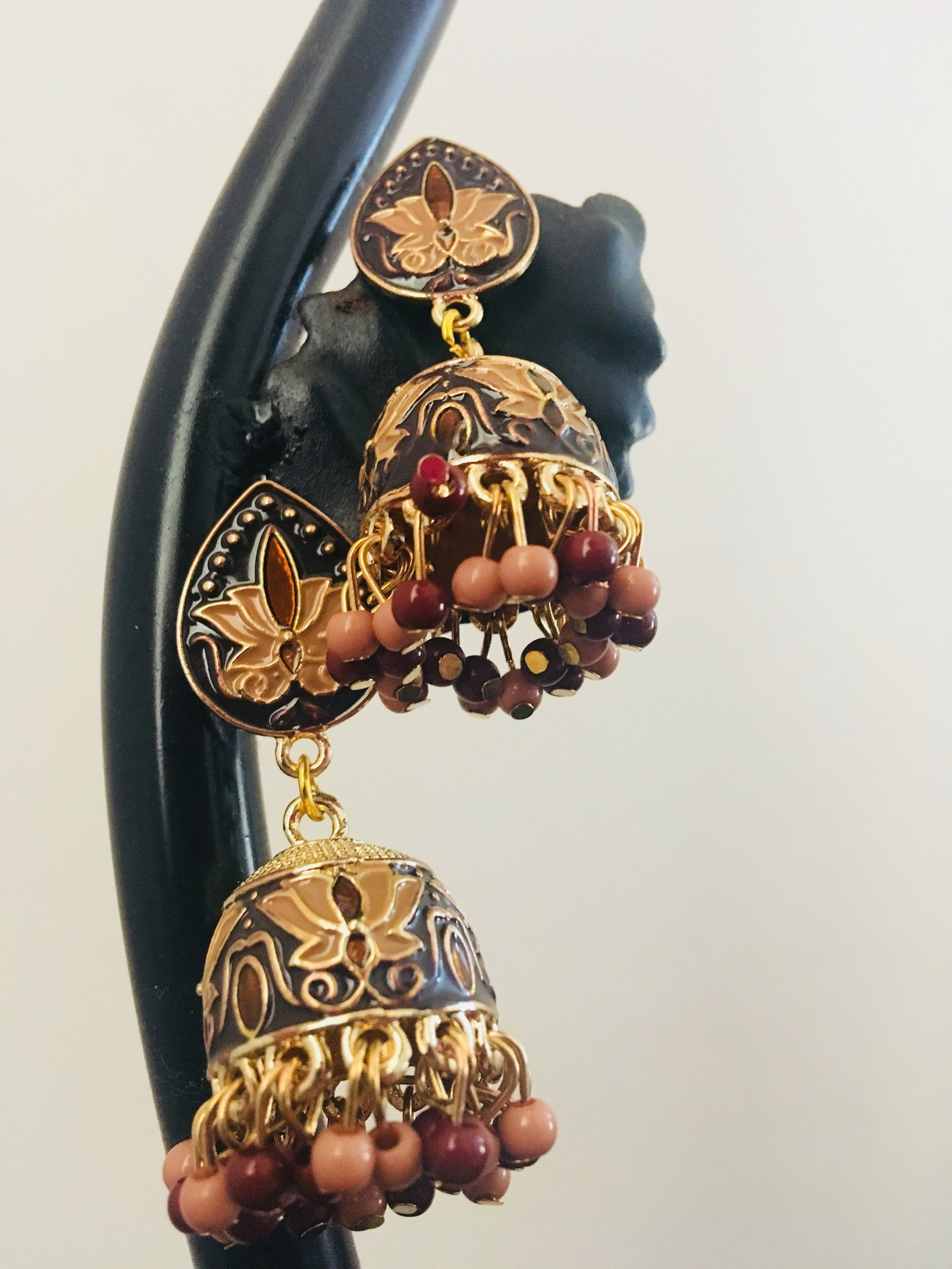 Brown and golden dome shaped jhumki