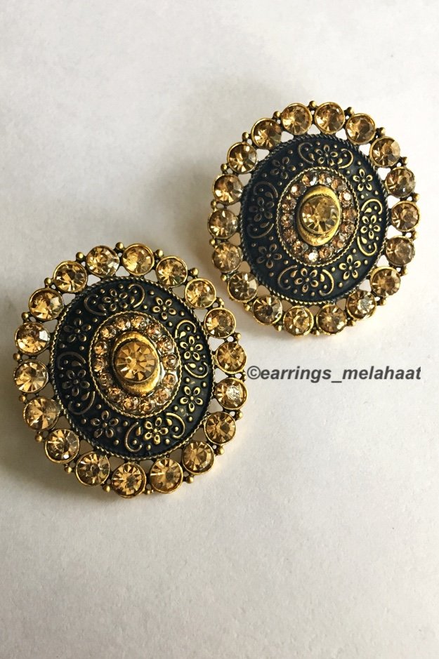 Bronze coloured round shaped earrings